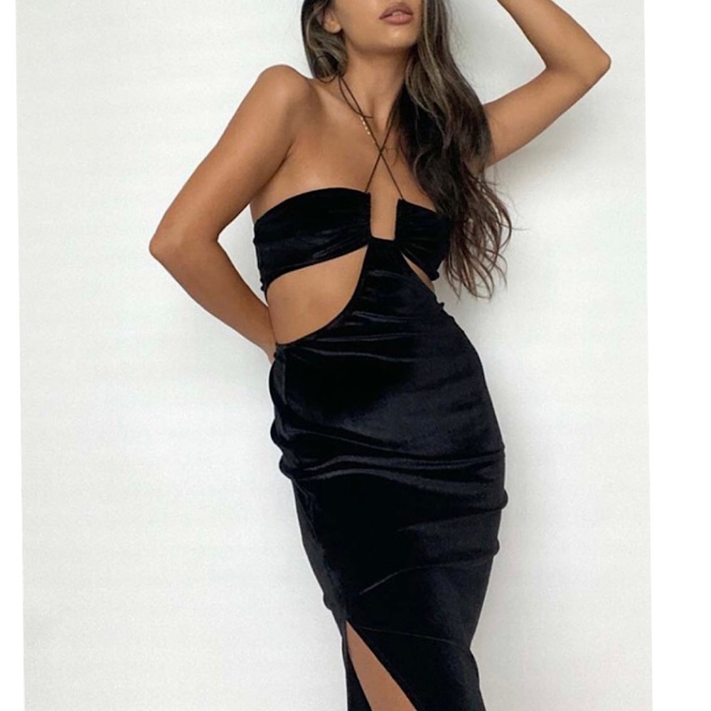 Black velvet halter neck midi dress with cut out detail and split hem!